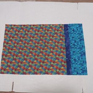 Standard pillowcase with vibrant whimsical cat pattern